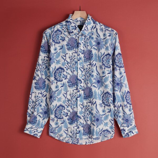 A blue and white patterned button up shirt