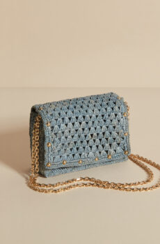 blue raffia bag with gold studs