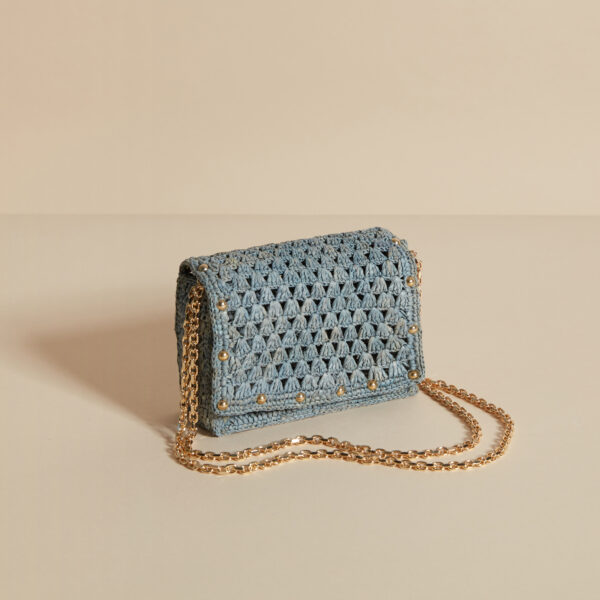 blue raffia bag with gold studs